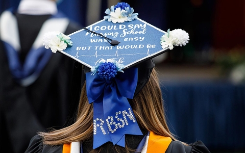 Grad with cap